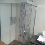 Cancel de baño de cristal templado en escuadra con hojas desnudas Cancel de baño de cristal templado en escuadra con hojas desnudas