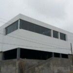 Fachada con ventanas fijas Fachada con ventanas fijas