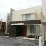 Fachada con ventanas combinadas Fachada con ventanas combinadas