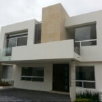 Fachada con ventanas combinadas Fachada con ventanas combinadas