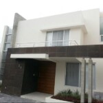 Fachada con ventanas combinadas Fachada con ventanas combinadas